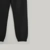 Front view of black joggers/sweatpants showing the adjustable drawstring waist and side pockets.
