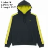 Black hoodie with neon yellow contrast panels on the sleeves and inside the hood.