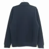 The plain back of a navy blue full-zip sweatshirt jacket with a stand collar and ribbed hem, displayed on a hanger.