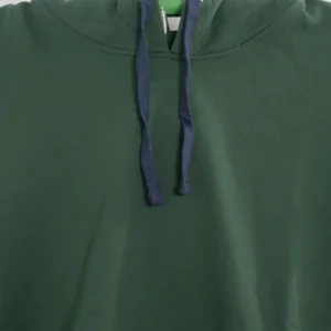 A dark forest green pullover hoodie on a hanger, showing a classic kangaroo pocket and blue/navy contrast drawstrings.