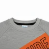 Front view of a grey, orange, and black long-sleeve kids' sweatshirt with a diagonal orange block that reads 