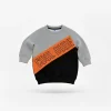 Front view of a grey, orange, and black long-sleeve kids' sweatshirt with a diagonal orange block that reads 