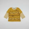 Front view of a mustard yellow toddler long-sleeve T-shirt with a white collar, featuring rows of bears, reindeer, snowmen, and trees print, and yellow-and-white striped sleeves with a layered look.