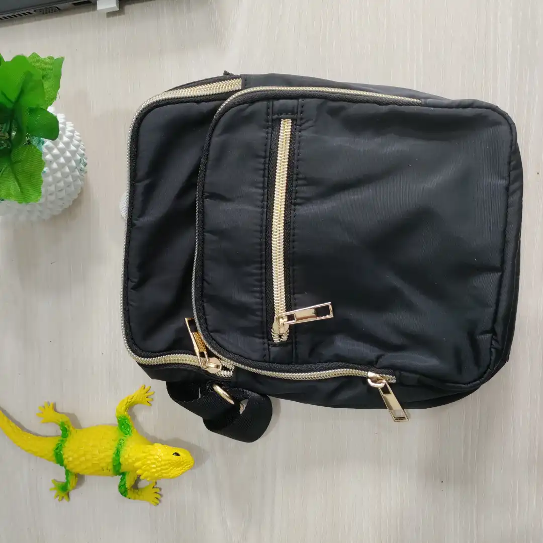 Premium crossbody bag with adjustable strap and multi-pocket design