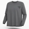 men’s charcoal gray long-sleeve crew neck t-shirt featuring a small black chest graphic and printed branding on the left sleeve.