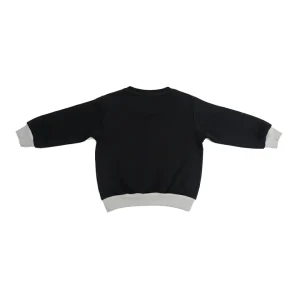 Back view of a plain black long-sleeve kids' sweatshirt with a light-grey hem and cuffs.