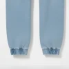 Image of CROPP light blue denim joggers with elastic waist and cuffed ankles, folded