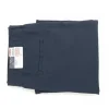 Image of folded Nautica navy blue joggers, highlighting the elastic waistband, rear slit pocket.